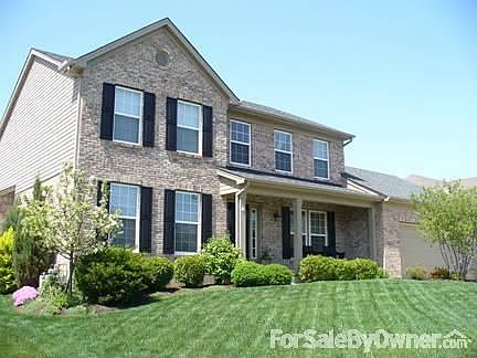 Two-story tradional style brick home.