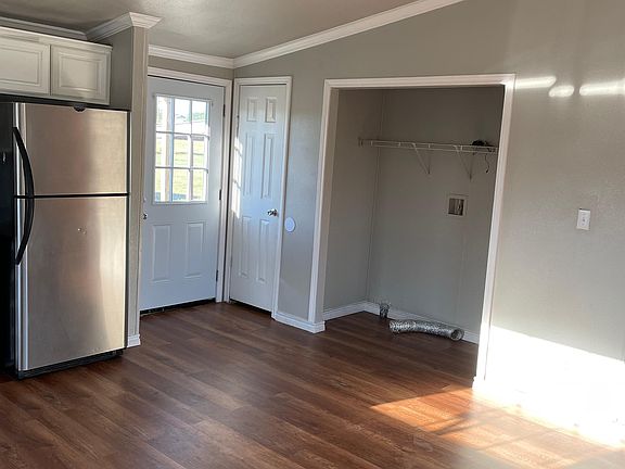 washer/dryer area looking at backdoor from kitchen