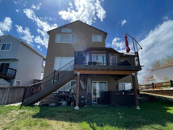 Back elevation. Walk out basement. Deck