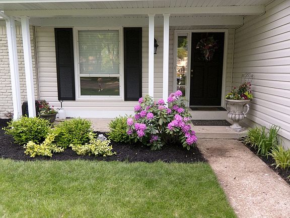 Front entrance after the new vinyl siding was installed
