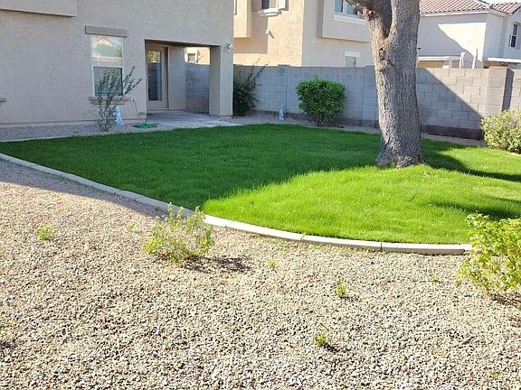 Back Yard and covered, shaded patio (north side)