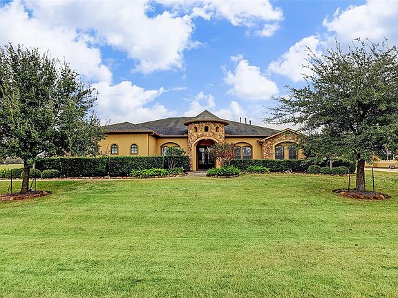Picturesque landscaping on a gracious lot. The grandiose entry way provides an appeal to any buyer! This home is a must see!