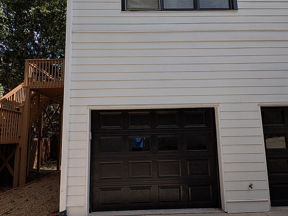 Entrance to apartment is via stairs to the 2nd floor. Includes access to one car garage and off street parking
