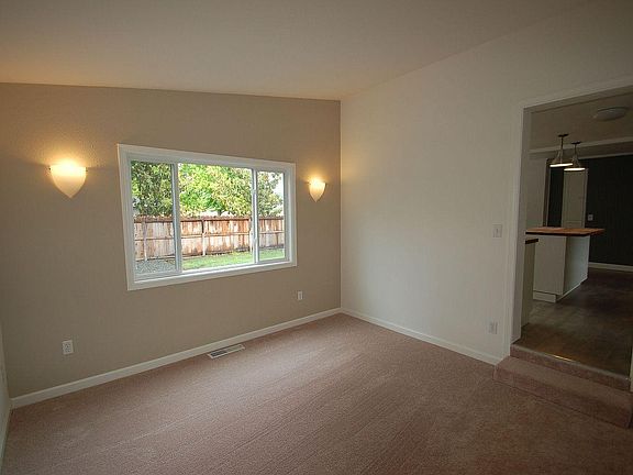Den/2nd living room located off kitchen