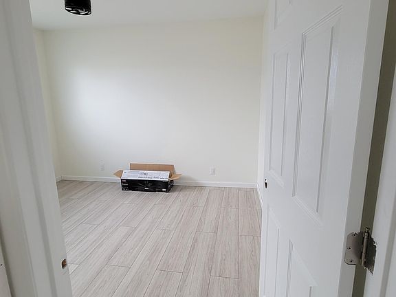 Bedroom unfunished before fan was installed