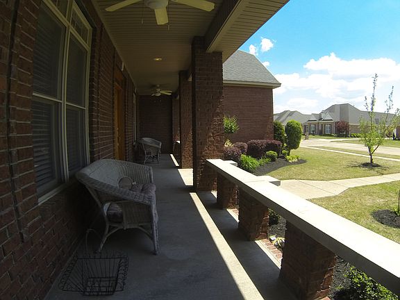 One of three covered porches