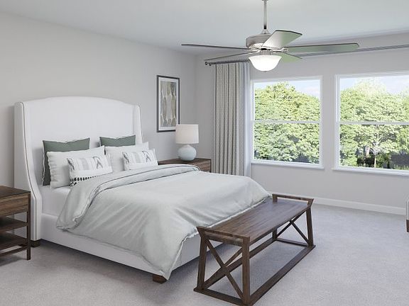A private escape, the owner s suite offers a deluxe en-suite bathroom with quartz countertops, an ov