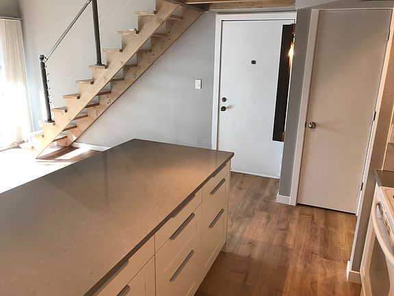 Kitchen looking toward entry door.