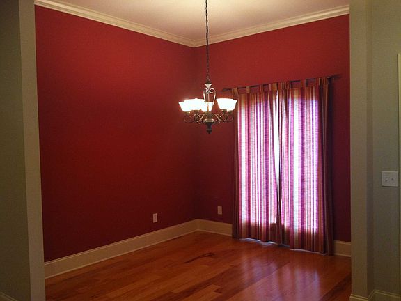 Formal Dining rm with hardwood floors.
