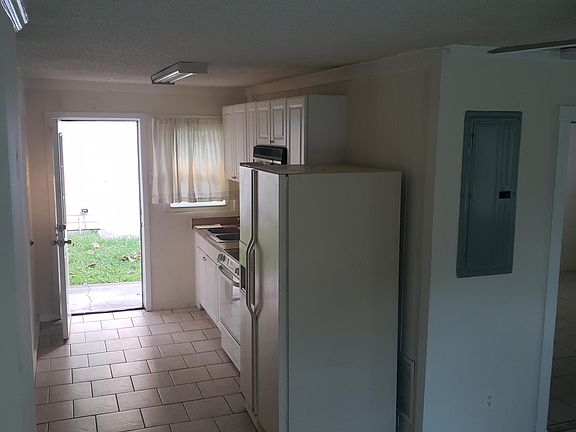 Looking back to kitchen and back entrance