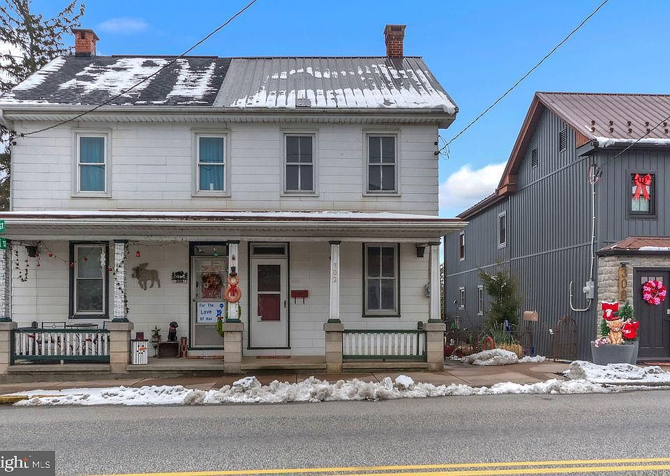1st image of 302 W Main St