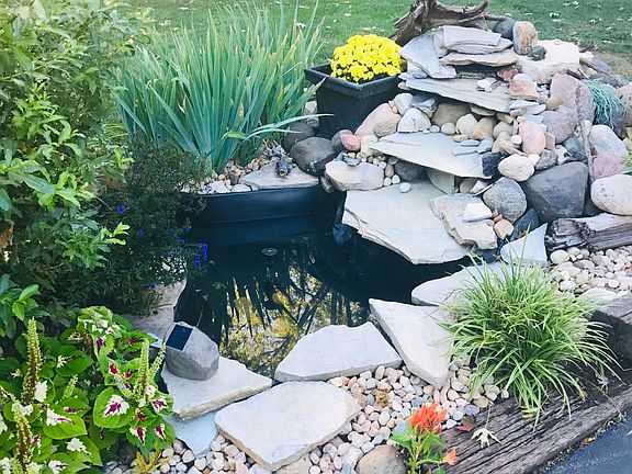 Hardscaped pond w/ waterfall