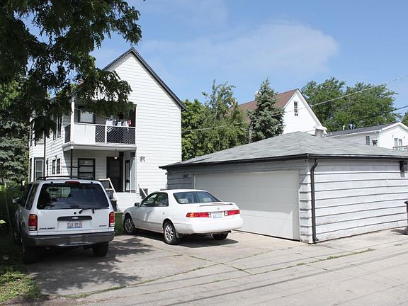 Back of the building with parking