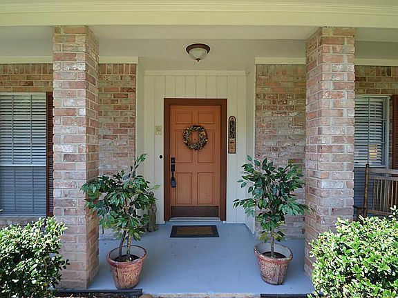 Front doorway and porch inviting you inside.