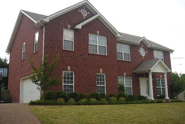 Stately brick home on over one-half acre.