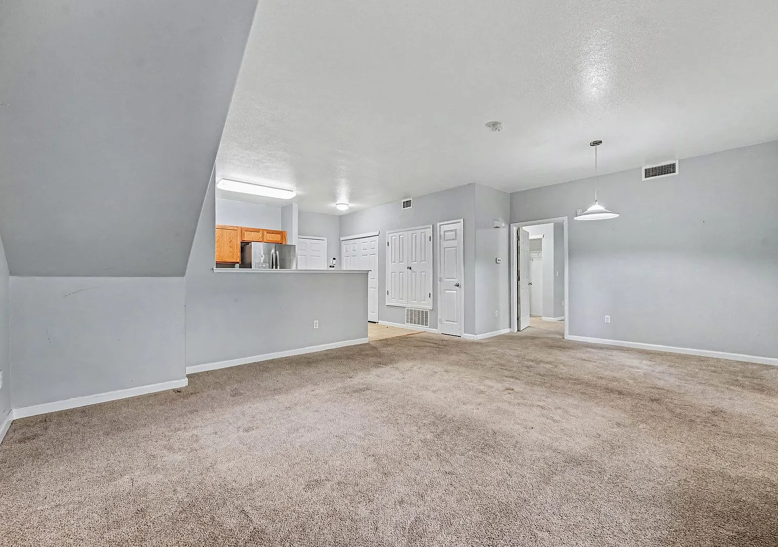 Spacious Ground-Level 2BR/2BA with 1-Car Garage & In-Unit Laundry — Photo 4