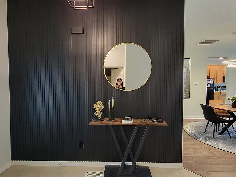 Sleek slat panel accent wall entryway