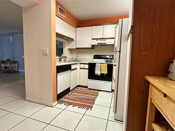 5th image of 10700 NW 14th St APT 144