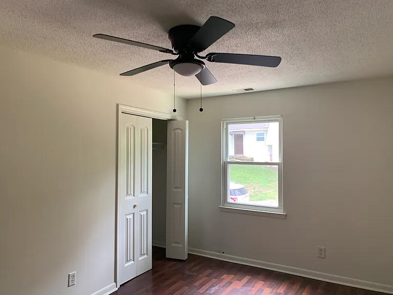 Bedroom 2 has hard surface flooring.