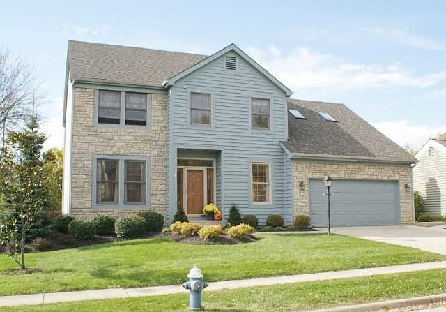 Freshly painted, stone and cedar 2 story