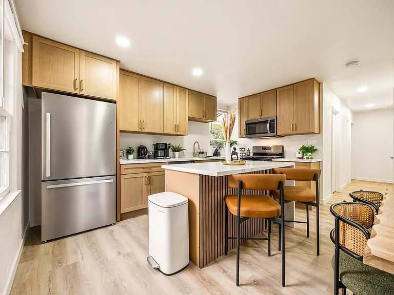 Dining area offers a comfortable space for shared meals, morning coffee, or game nights.