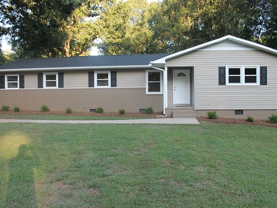 New Siding, Roof & Gutters