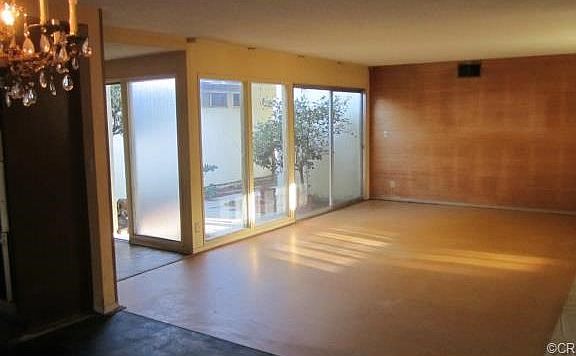 LIVING ROOM LOOKING INTO THE COURTYARD ATRIUM