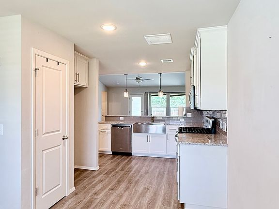 5th image of 8601 N 76th East Pl