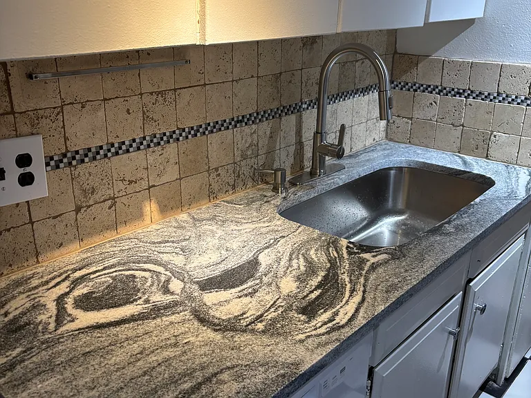 Brand new granite counter top and dishwasher - December 2024