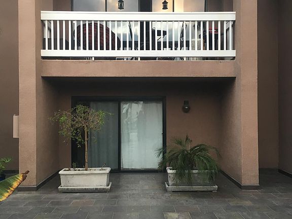 First and second floor unit with patio and deck