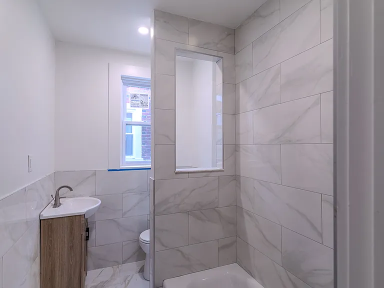full bathroom with modern tile