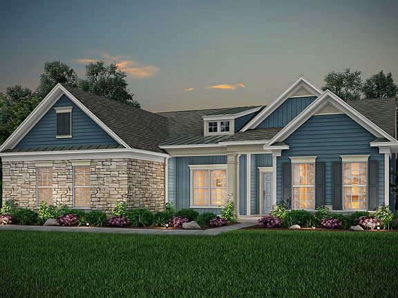 Dunwoody Way Exterior 6 features stone, siding, covered front porch and 2 car side load garage