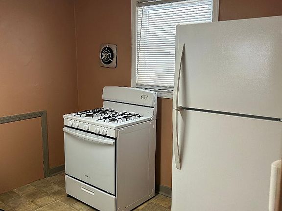 Kitchen
Stove, Refrigerator and Portable Dishwasher
Will have new laminate flooring at Move-In