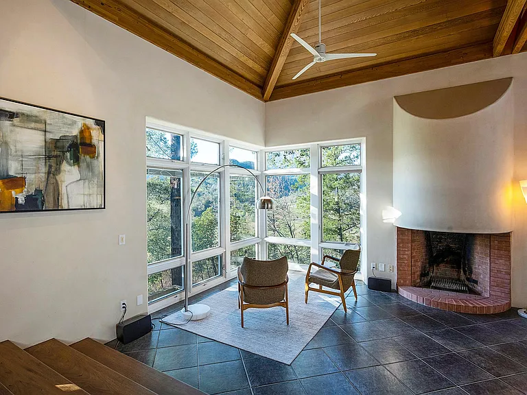 Living Room Corner Seating with Sonos System and Speakers