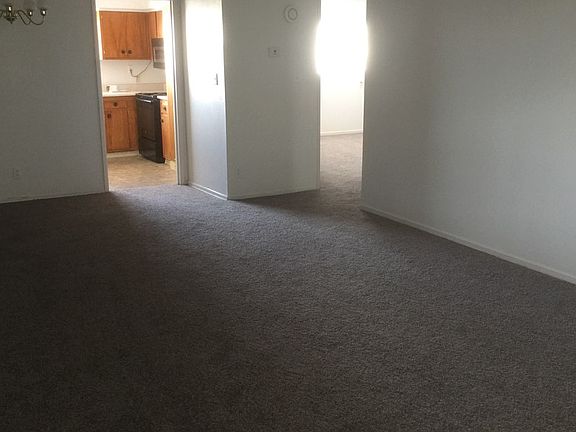 Fully carpeted living room 