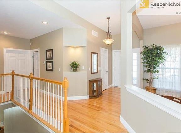 Entry opens to Living Room and Formal Dining Room