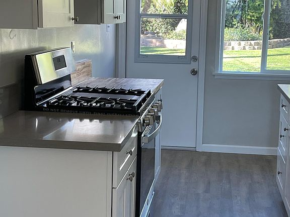 Kitchen with new cabinets, New GE self cleaning stove