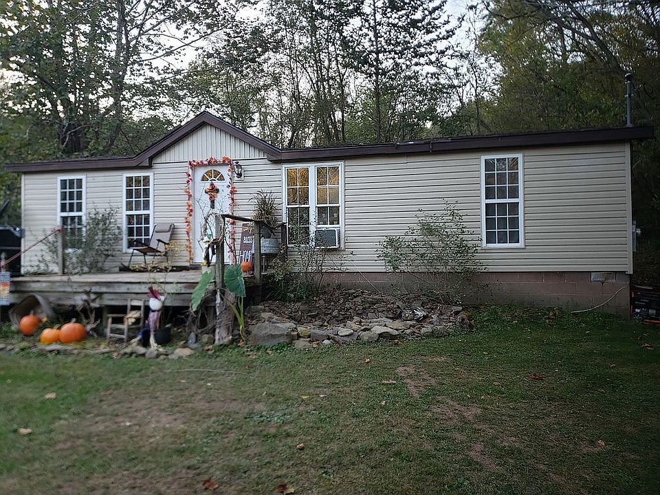 Small pond on right of porch
