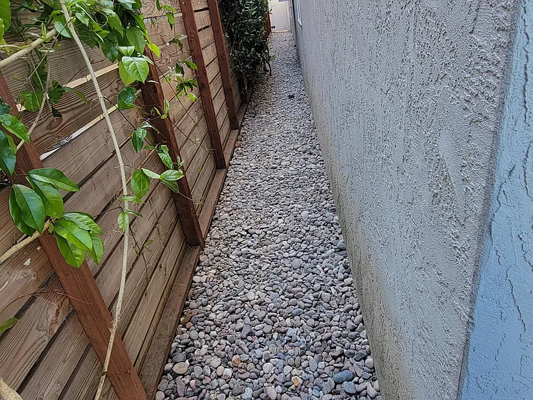 South side of house with Arizona River rock.