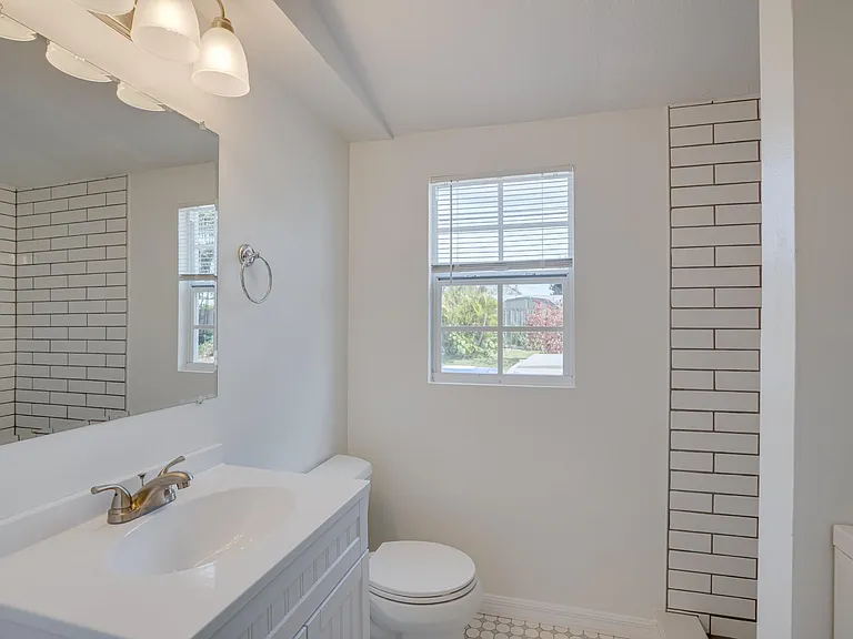 Completely remodeled 3/4 bath with in-unit laundry