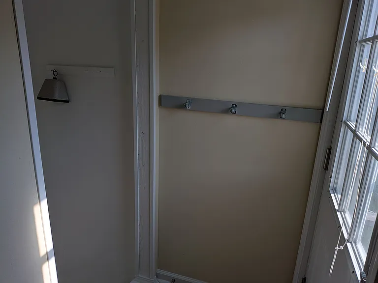 Side exterior door and stairway to basement (view from kitchen).