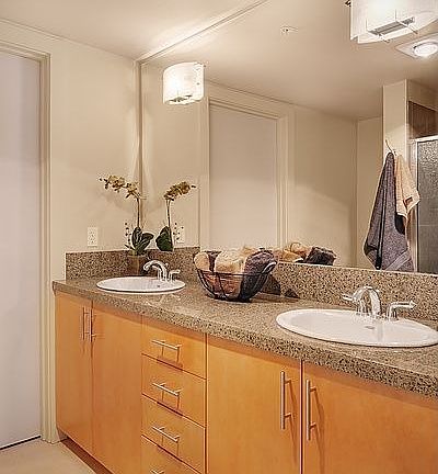 large bathroom with granite counter tops