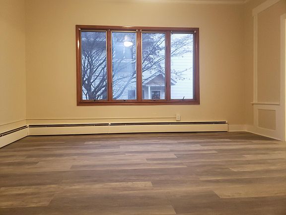 Dining Room with large windows. This was a cloudy day. The next house is not very close, allowing plenty of sunlight on sunnier days.