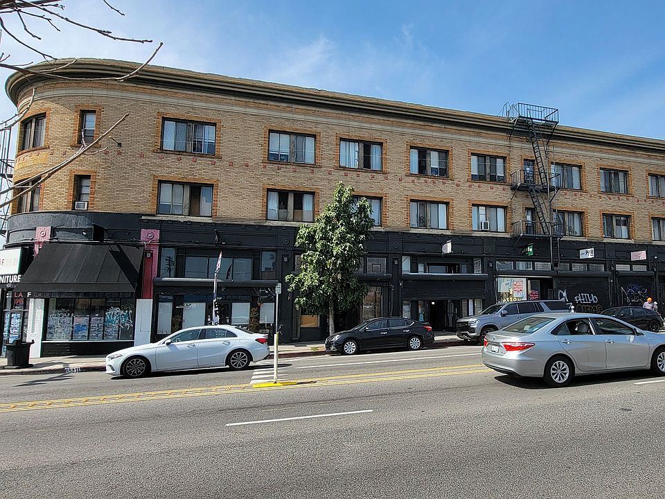 Mid-day street view of the Western at Rosewood apartments in Los Angeles, California.