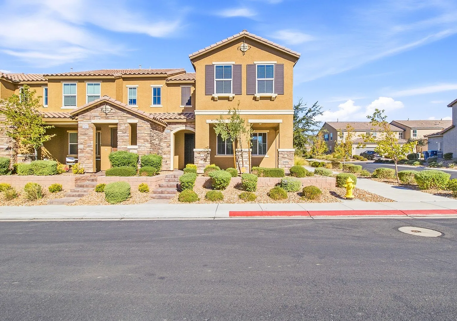 Modern 3-Bedroom Townhome with Open Living & Prime Henderson Location — Photo 1