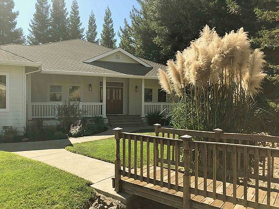 Front Yard w/Foot Bridge