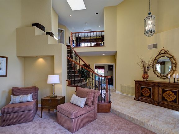 Magnificent two story entry leading to upstairs study.