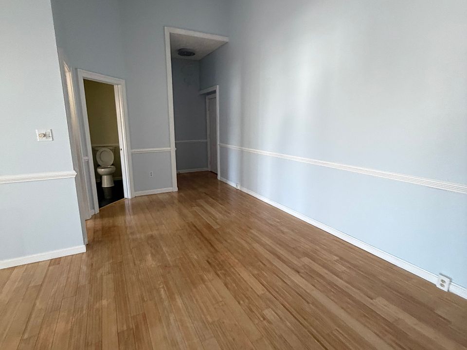 View from living room to the foyer entry way.