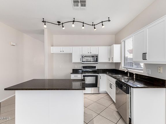 4th image of 10509 E FLOWER Avenue