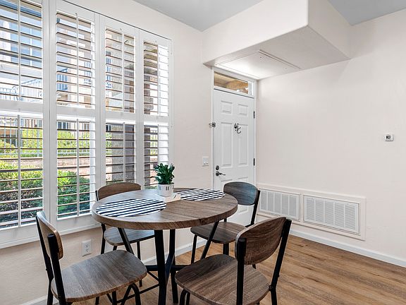 Fully furnished with table for four.